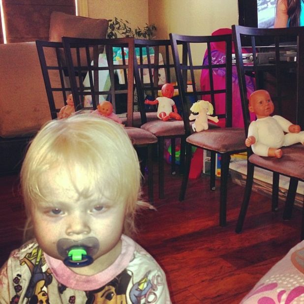 "Be afraid. Be very afraid." -- Brooke Bradshaw, age 2, after moving all of the kitchen chairs into the living room and carefully placing a doll on each chair.  Mom, Lauren Bradshaw, admits there's "something a little creepy about this photo bomb."