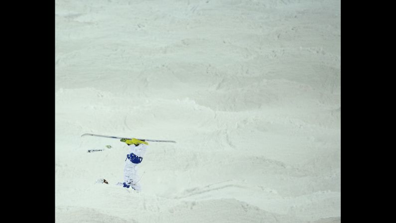 Russia's Sergey Volkov tumbles during the men's moguls.