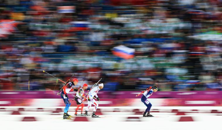 Norwegian biathlete Ole Einar Bjoerndalen takes the lead during the men's 12.5-kilometer pursuit on February 10.