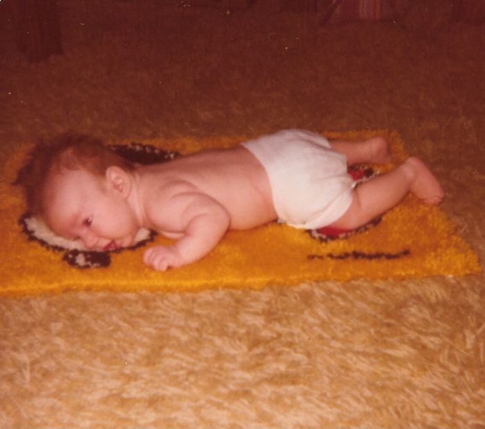 "Push-ups are harder than I thought. Please, Mom, flip me over." -- Rick Cordsen, age 6 weeks. He's 35 now, and still isn't a fan. 