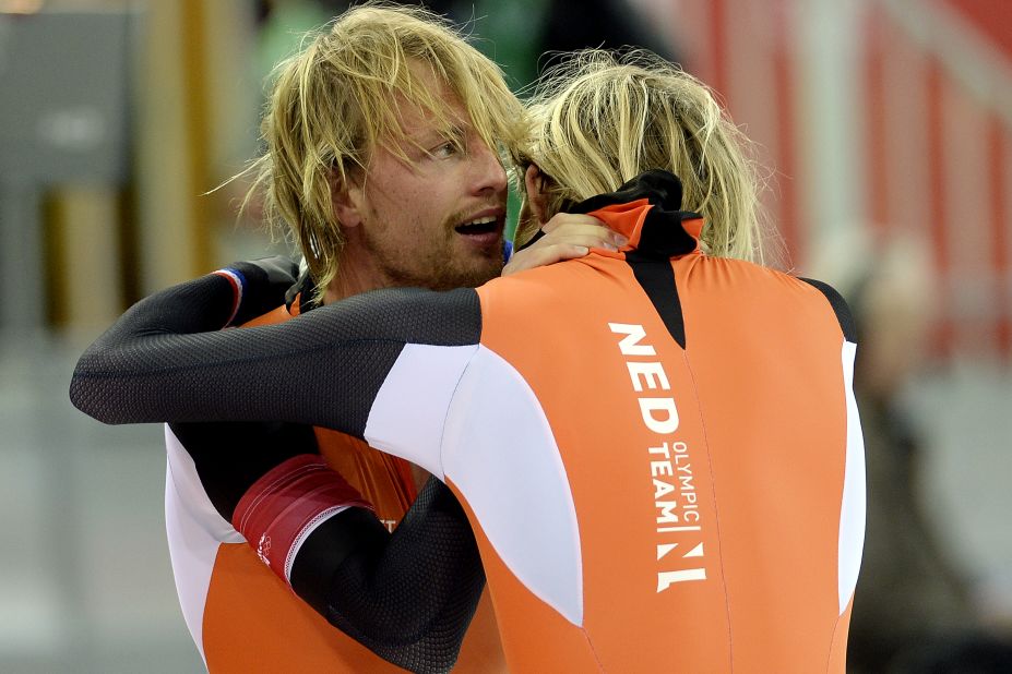 Twins Michel and Ronald Mulder of the Netherlands hug after the 500-meter speedskating event on February 10. Michel won the event, and Ronald finished third.
