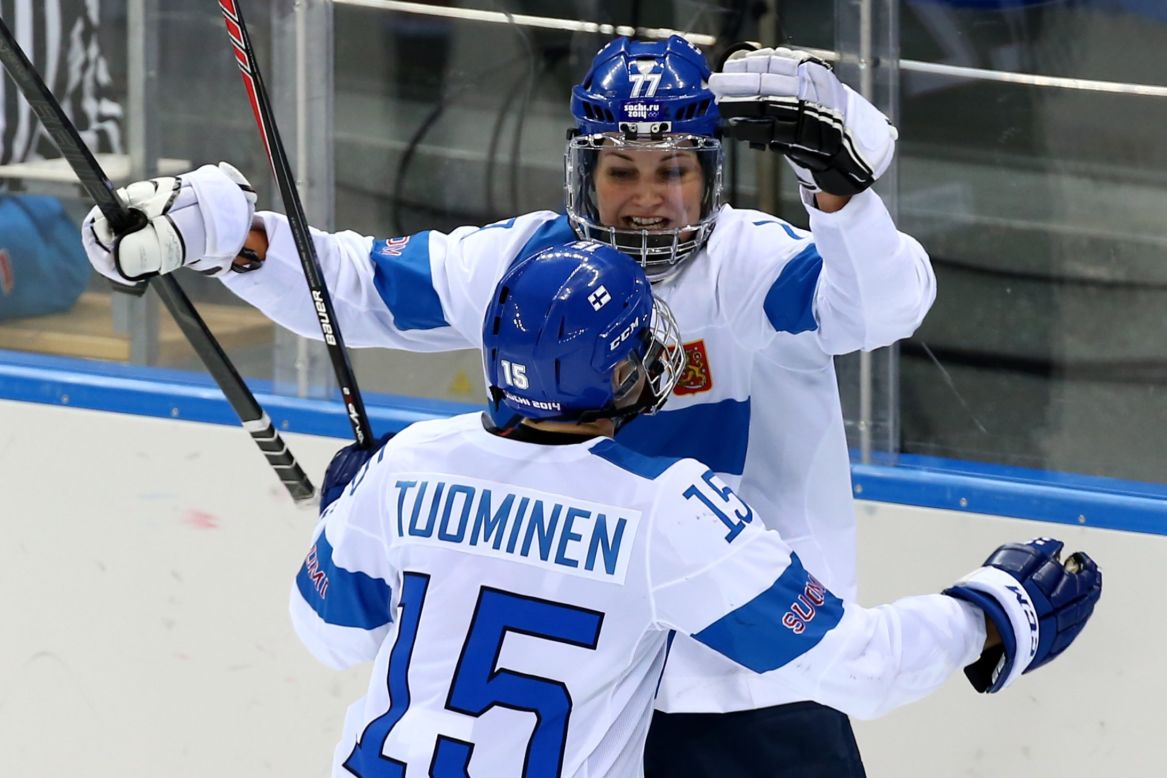 "In Finland women's ice hockey is not that popular at the moment, so this will really help to inspire people to get interested in the sport," says Susanna Tapani, here celebrating with teammate Minnamari Tuominen after scoring a goal against the U.S. in a preliminary round Group A game.