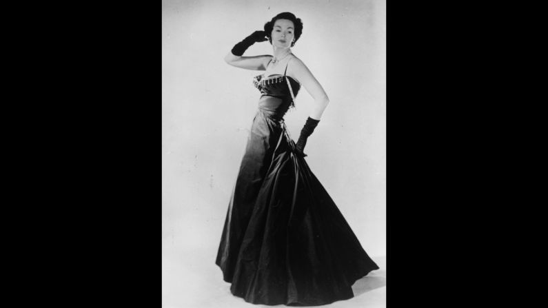 In 1947, model Barbara Goalen shows off a Christian Dior evening dress, part of the "New Look" that Dior helped to popularize after the austerity of Word War II.