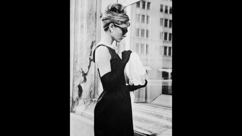 Actress Audrey Hepburn embodies ladylike fashion in a stunning black dress in "Breakfast At Tiffany's." Hepburn was close friends with Hubert de Givenchy, who made many of the dresses she wore in films and in her own life.