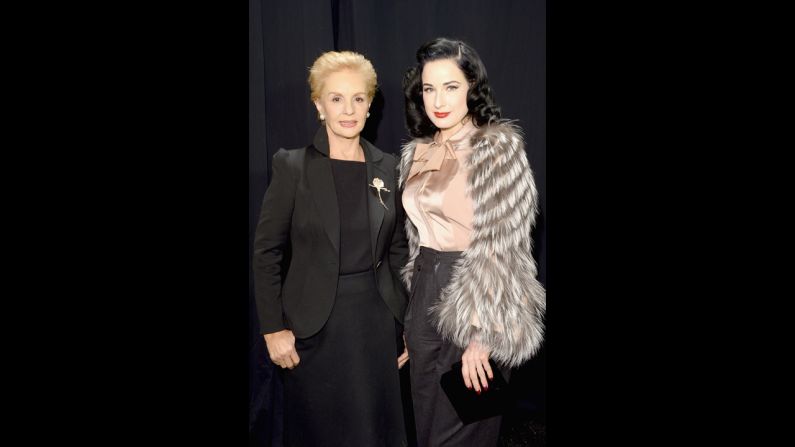 Designer Carolina Herrera, left, poses with fashion muse and burlesque dancer Dita Von Teese backstage at Mercedes-Benz Fashion Week in February.