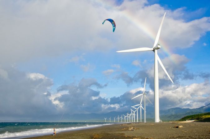 Nothing says "I'm on vacation" like an Instagram of yourself sunning next to a giant windmill.