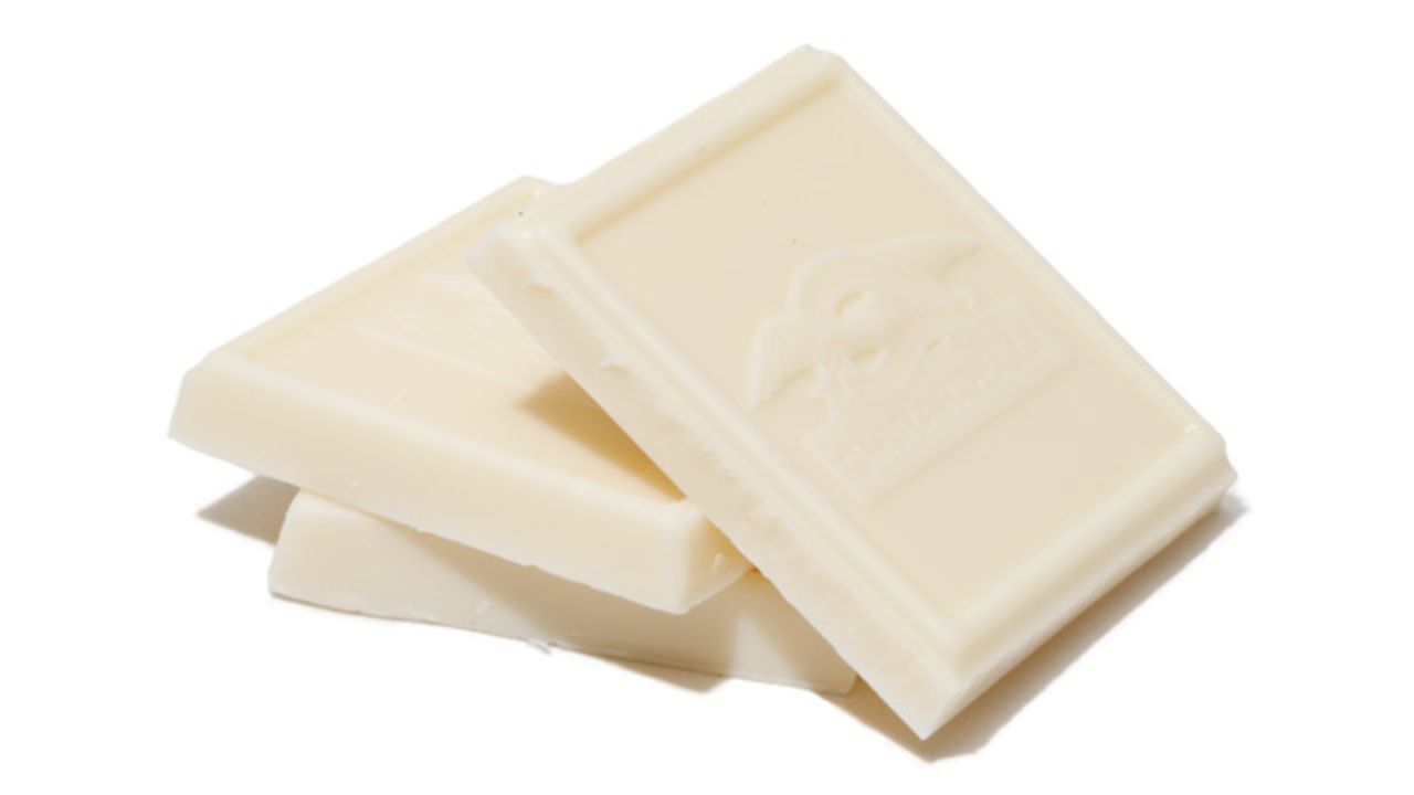 <strong>White Chocolate</strong> -- Because it contains no cocoa, white chocolate is not actually chocolate. It's made from cocoa butter (the fat from the bean), sugar, vanilla, and milk solids. You can use white chocolate to add creaminess and structure in some surprising places, such as vanilla ice cream.