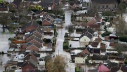 Water surrounds flooded propeties in the village of Moorland on the Somerset Levels near Bridgwater on February 10, 2014 in Somerset, England.