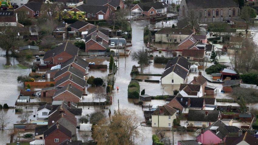 Water surrounds flooded propeties in the village of Moorland on the Somerset Levels near Bridgwater on February 10, 2014 in Somerset, England.