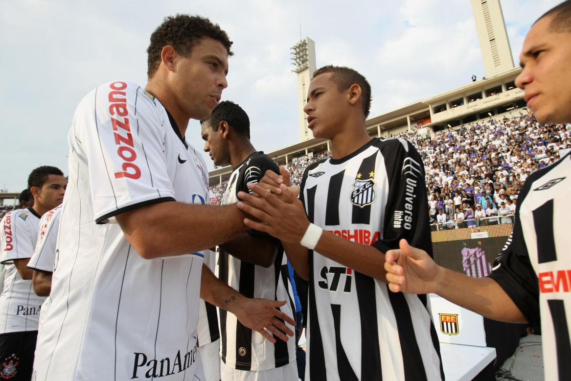 World Cup winner Ronaldo, seen here playing for Corinthians against Neymar's Santos in 2009, is one of several individuals involved in the Barca star's business affairs.