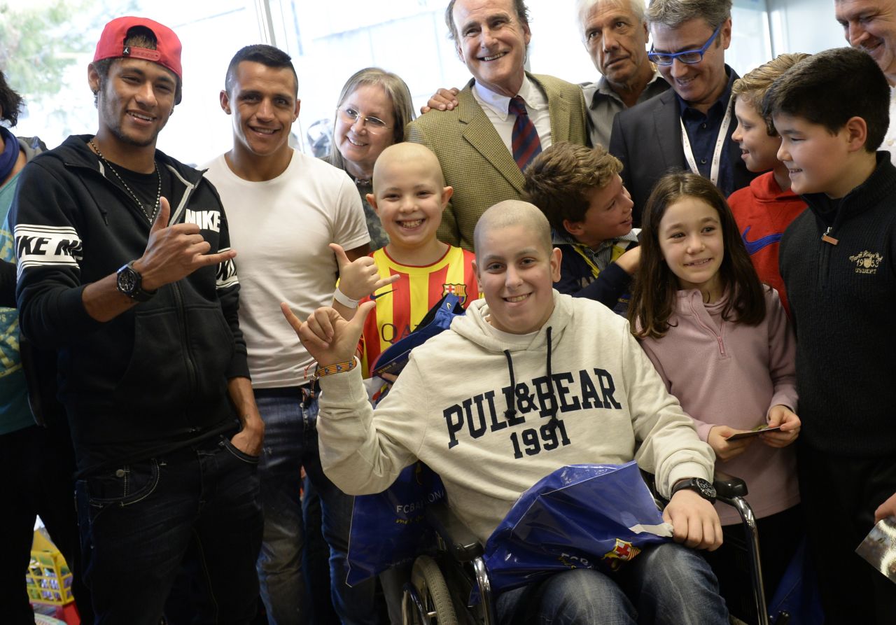 Barcelona is a club that has grown its off-field image to accompany its stunning on-field success, with the Spanish side having been crowned kings of Europe four times. Here, Neymar accompanies Alexis Sanchez during a charity visit to Barcelona's Hospital del Mar. 