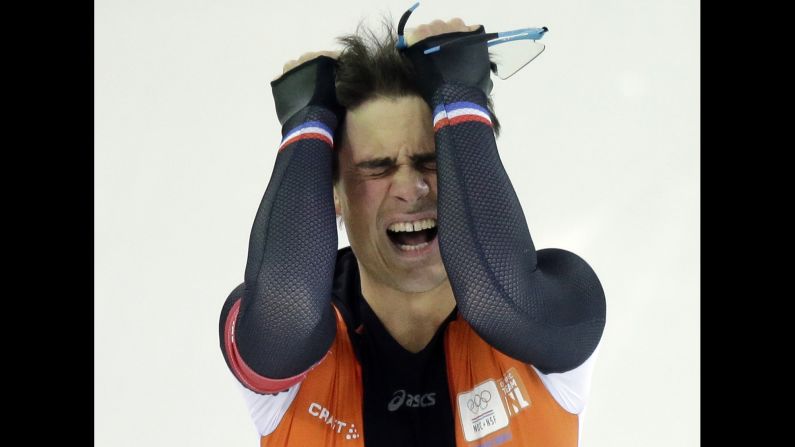 Jan Smeekens of the Netherlands pulls his hair after completing his second heat in the men's 500-meter speedskating race on February 10.