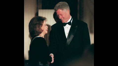 President Bill Clinton greets Temple Black during a reception prior to the 1998 Kennedy Center Honors.