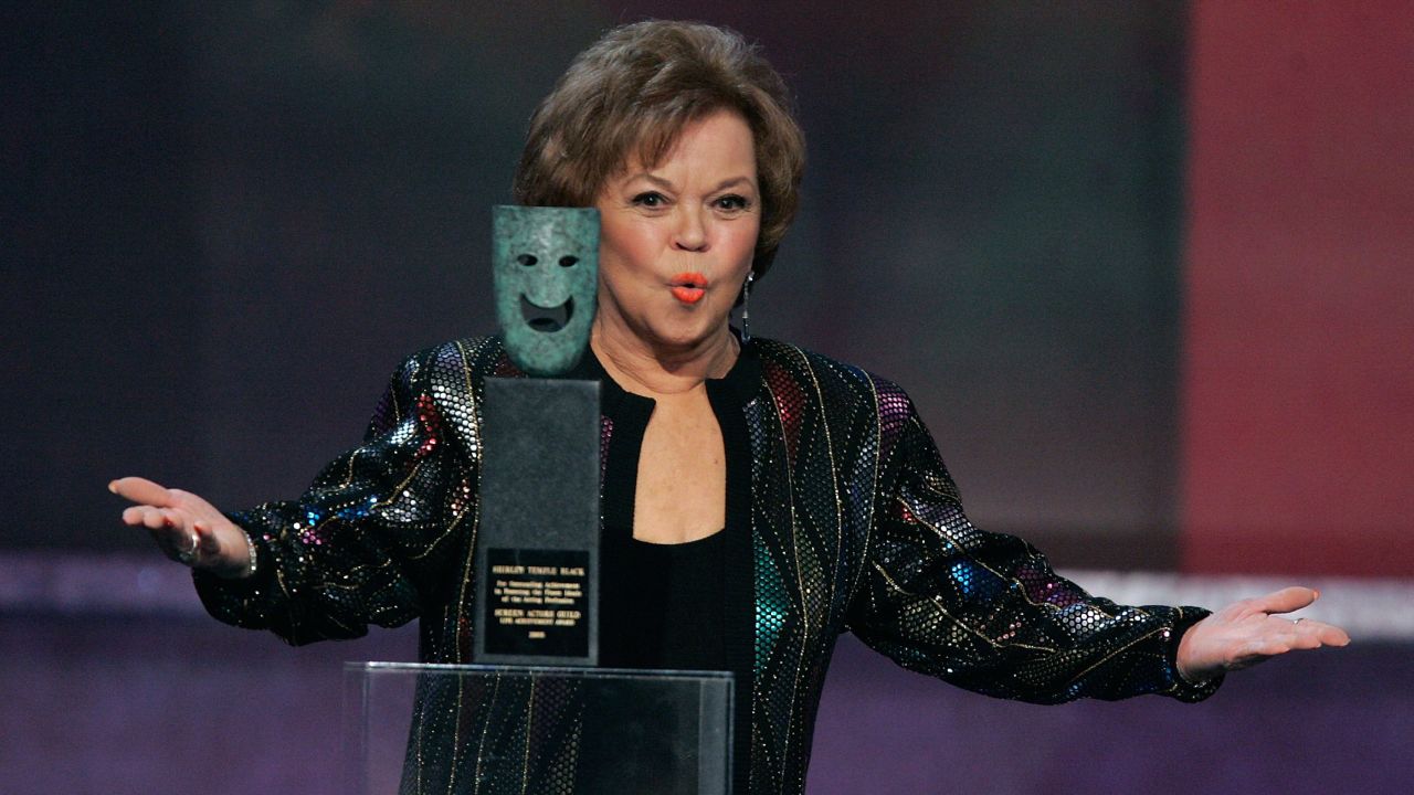 Temple Black accepts the Screen Actors Guild Life Achievement Award onstage during the awards show in 2006.