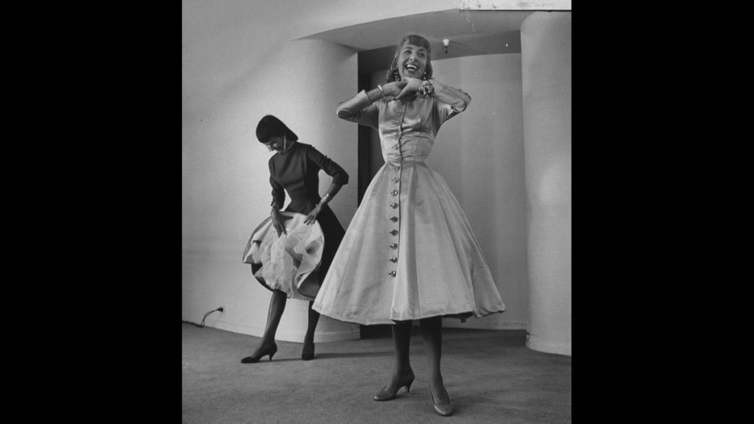 The 1950s saw a return to a more feminine style, with designer Anne Fogarty (pictured) leading the way. "Fogarty had the tiniest, tiniest waist, and made all these corseted dresses -- but also was a successful career woman herself," said Arnold. "It was a combination of being very 'housewifey' but also very powerful and dramatic."
