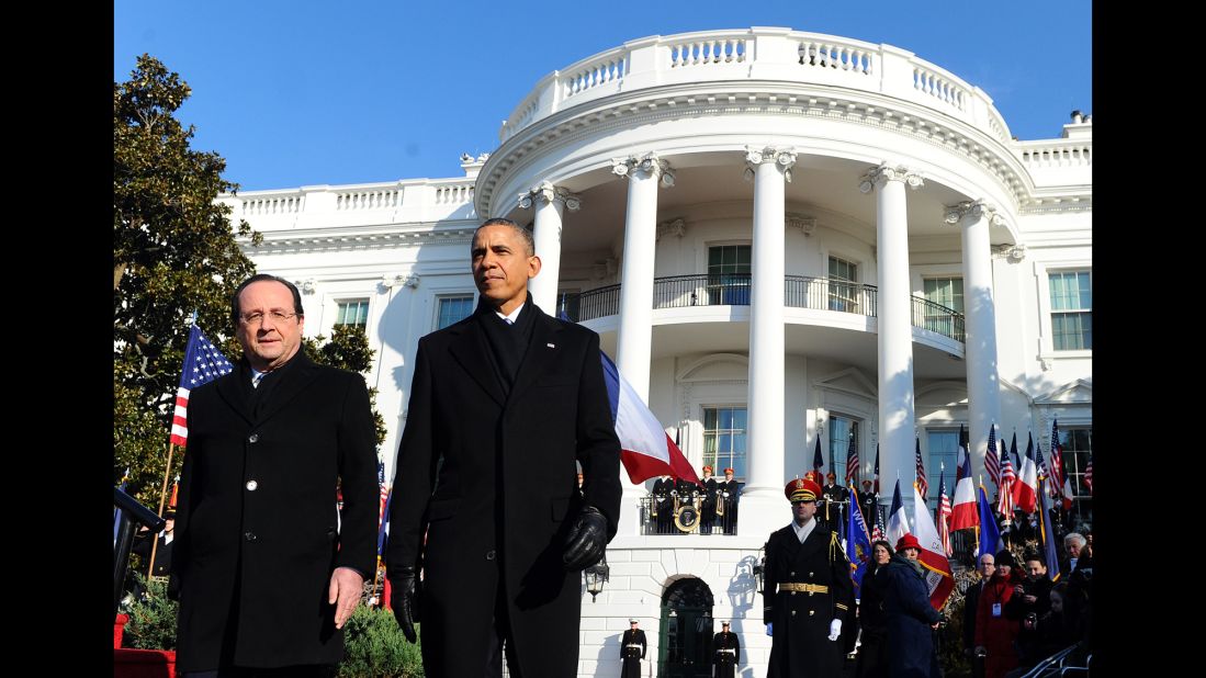 U.S. President Barack Obama escorts French President Francois Hollande for a review of the honor guard during a ceremony at the White House on Tuesday, February 11. Hollande's three-day state visit is designed to underscore historic ties and a burgeoning security relationship between America and its oldest ally.