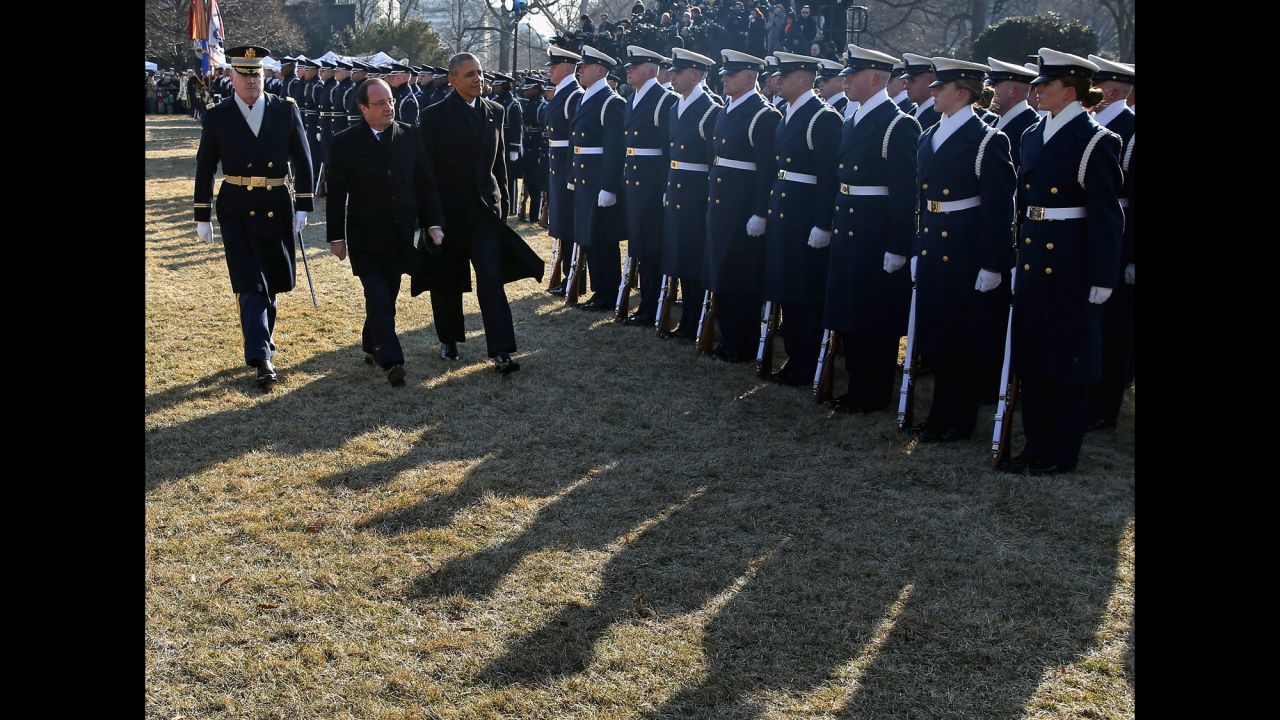 Obama and Hollande review troops on the South Lawn of the White House on February 11. The two leaders were scheduled to hold bilateral meetings and a joint news conference before an official state dinner later in the day. 