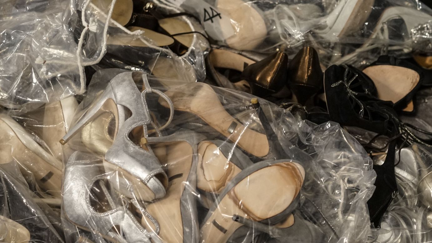 Packages of shoes in different styles and sizes are seen backstage at the Badgley Mischka show on February 11.
