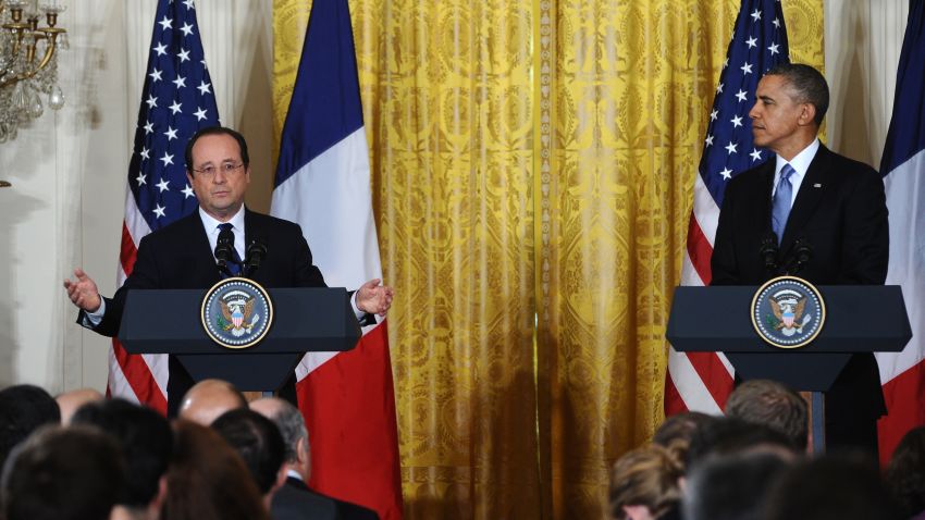 President Barack Obama and French President Francois Hollande hold a joint press conference during a state visit in the East Room of the White House in Washington, DC