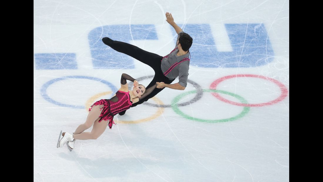 Paige Lawrence and Rudi Swiegers of Canada compete in pairs figure skating on February 11.