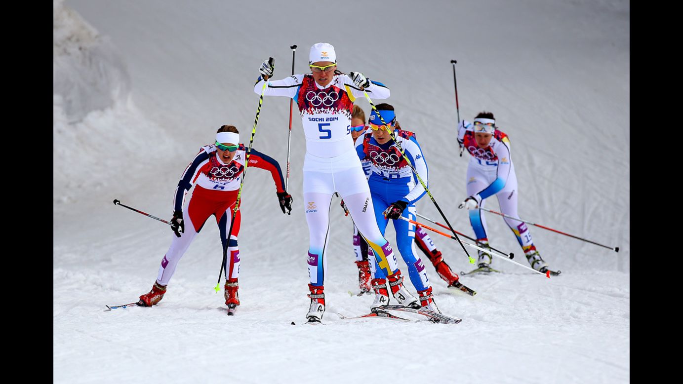 Ida Ingemarsdotter of Sweden leads a pack of skiers in the women's cross-country sprint on February 11.