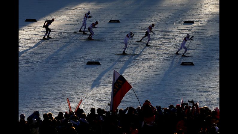 Cross-country skiers compete in the finals of the men's sprint event February 11.