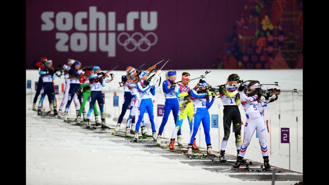 Biathletes compete in the women's 10-kilometer pursuit on February 11.