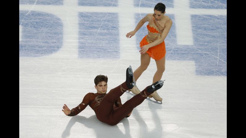 Italy's Matteo Guarise falls during his performance with Nicole Della Monica during pairs figure skating on February 11.