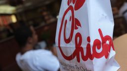 A Chick-fil-A logo is seen on a take out bag at one of its restaurants on July 28, 2012 in Bethesda, Maryland. Chick-fil-A, with more than 1,600 outlets mainly in the southern United States, has become the target of gay rights activists and their allies after president Dan Cathy came out against same-sex marriage last week. AFP PHOTO/Mandel NGAN