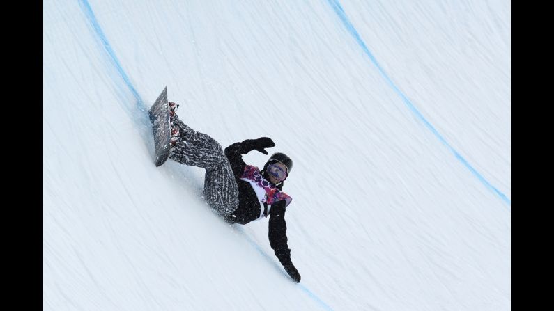 Finnish snowboarder Markus Malin falls on the halfpipe on February 11.