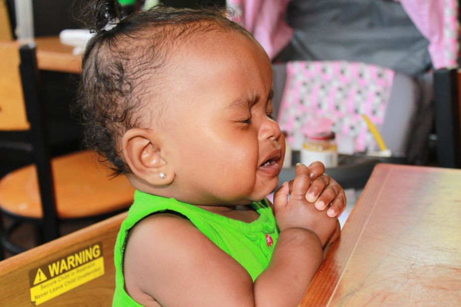 "Oh please don't let it be more squash flavored baby food!" -- Mia Lockett, age 11 months, has a sophisticated palate.