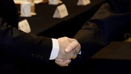 Taiwanese official Wang Yu-chi (L) who is in charge of the islands China policy shakes hands with his Chinese counterpart Zhang Zhijun from the Taiwan Affairs office (R) at the start of their meeting in Nanjing on February 11, 2014.