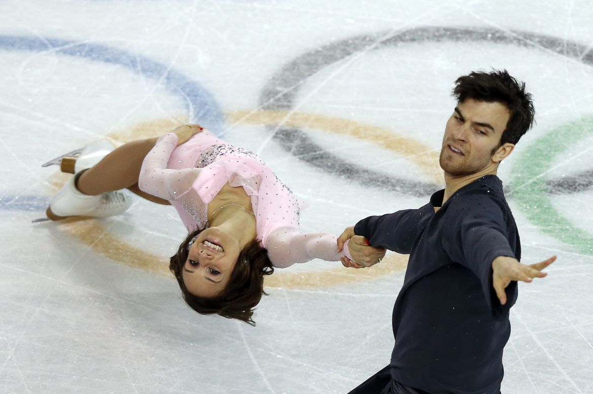 Canada's Meagan Duhamel and Eric Radford perform their short program in the pairs figure skating event.