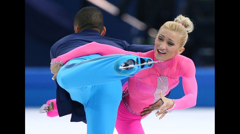 Aliona Savchenko and Robin Szolkowy of Germany compete in pairs figure skating.