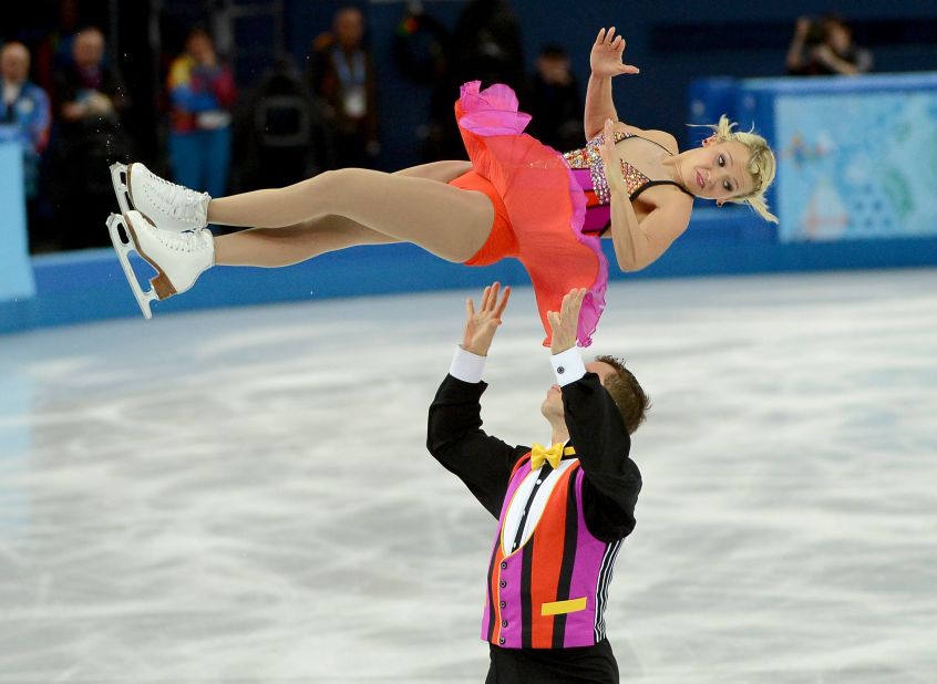 Canada's Kirsten Moore-Towers flies in the air after being thrown by Dylan Moscovitch in pairs figure skating February 11.