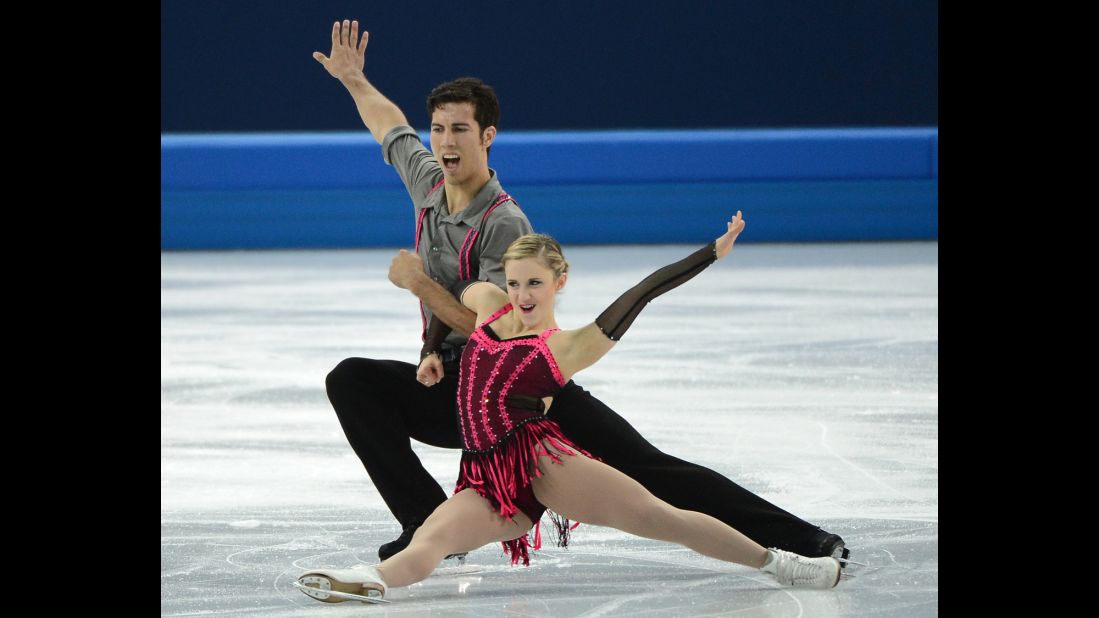 Canadian figure skaters Paige Lawrence and Rudi Swiegers continue their routine.