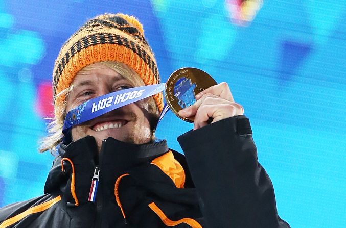 Michel Mulder of the Netherlands poses with his gold medal after winning the 500-meter speedskating event on February 11.