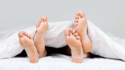 couples feet bed