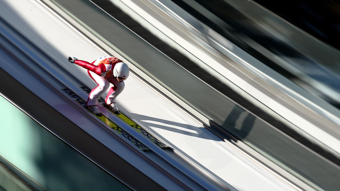 Magnus Krog of Norway slides down the normal hill ski jumping ramp during the Nordic combined on February 12.