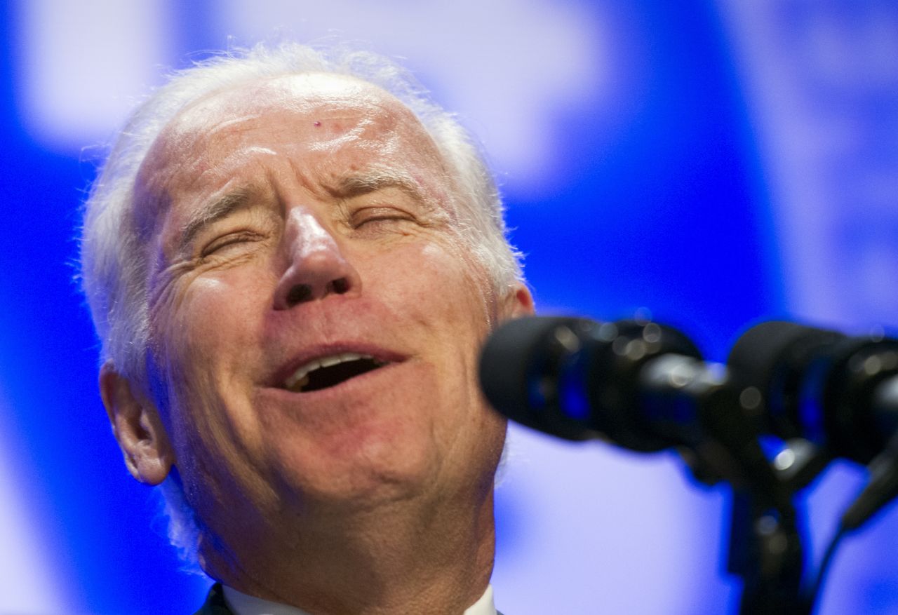 Joe Biden laughs while speaking at the UAW National Community Action Program Conference in Washington in February 2014.