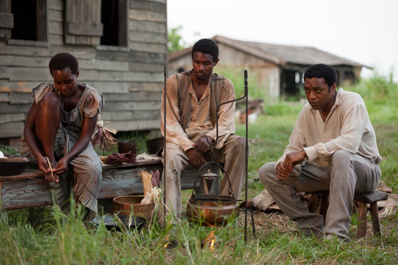 "12 Years A Slave" chronicles the true story of Solomon Northup, a free black man who was kidnapped and sold into slavery (played by Chiwetel Ejiofor, right).