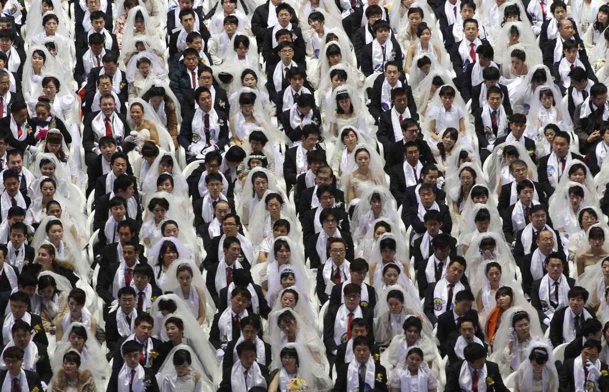 FEBRUARY 12 - GAPYEONG, SOUTH KOREA: Some 2,500 South Korean and foreign couples exchange or reaffirm marriage vows in a mass wedding ceremony arranged by Hak Ja Han Moon, the wife of the late Rev. Sun Myung Moon, the<a href="http://edition.cnn.com/2012/09/02/world/asia/south-korea-reverend-moon-dead/"> controversial founder of the Unification Church</a>.