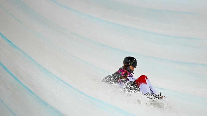 Snowboarder Alexandra Duckworth of Canada crashes out in the women's halfpipe semifinals on February 12.