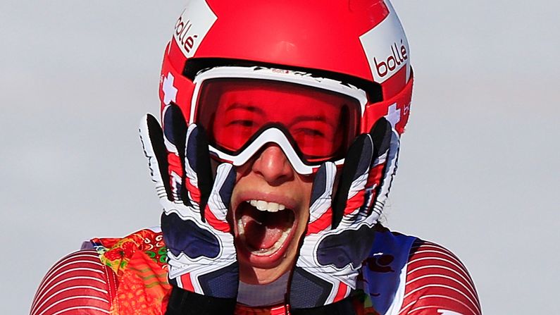 Swiss skier Dominique Gisin reacts after finishing her run in the downhill event February 12.