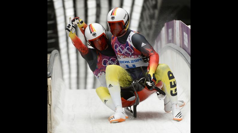 Germany's Tobias Arlt and Tobias Wendl celebrate their win in luge doubles on February 12.