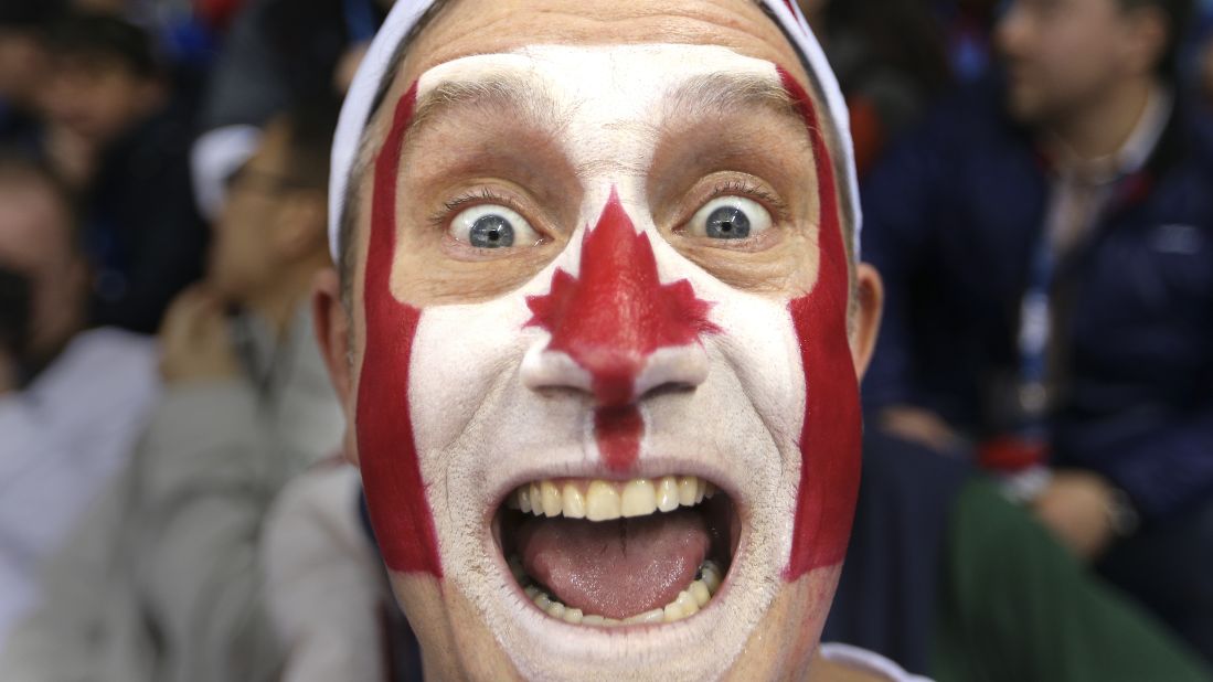 Benoit Lamy shows his support for Canada during the women's hockey game against the United States on February 12.