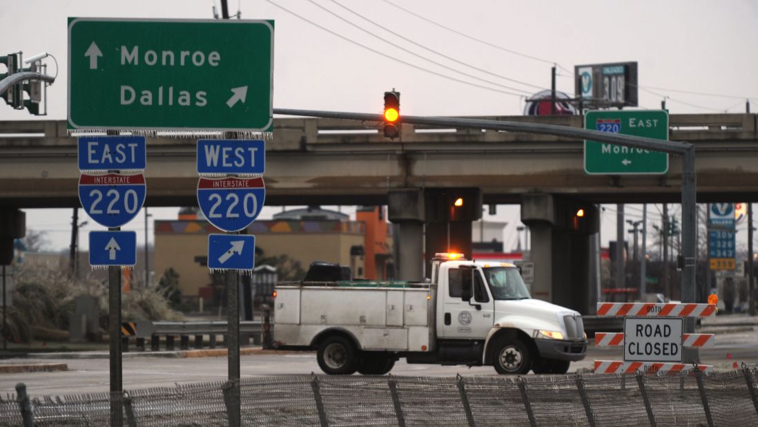 A truck in Bossier City, Louisiana, blocks access to Interstate 220, which was closed because of icy conditions on February 12.