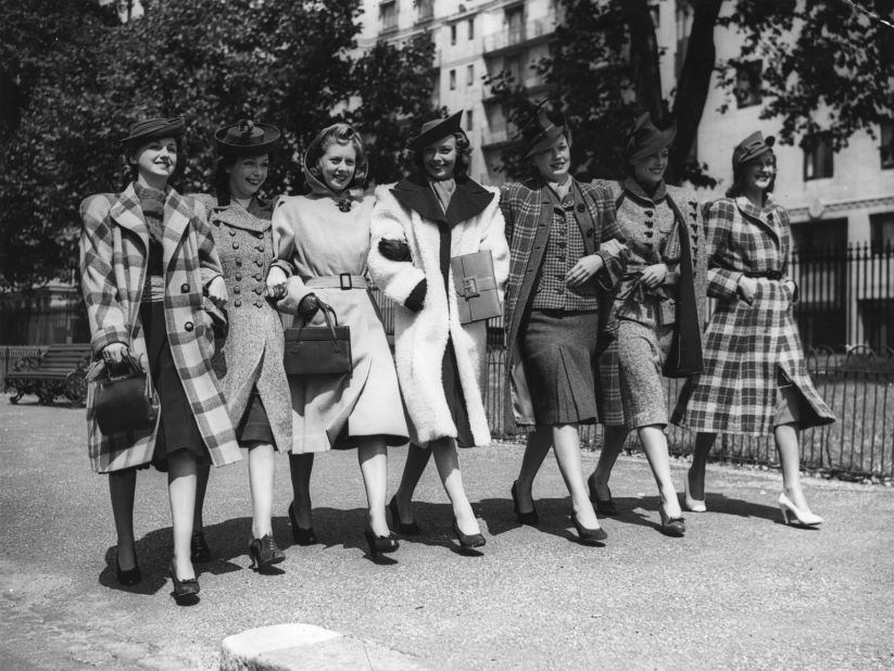These American models from 1940 know how to dress to impress. But how has women's work wear evolved over the last century? And who were some of the pioneering power dressers who helped shape it? 