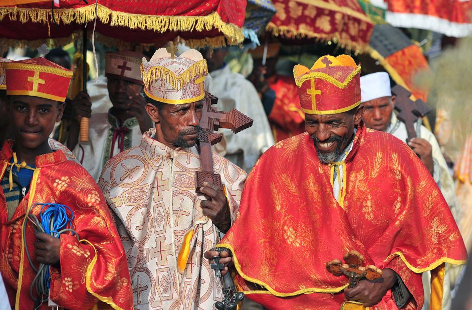 On the eve of Timket, Ethiopian Orthodox Christian priests prepare sacred replicas of the Ark of the Covenant -- the chest that carried the 10 Commandments -- and parade them in a slow procession to the Fasilides Bath.