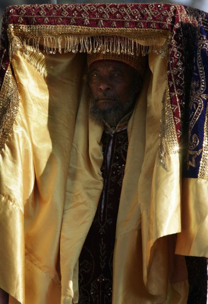 The tabot is wrapped in cloth the day before Timket. The Ethiopian Orthodox Christian priests then carry the relics on their head through the streets.